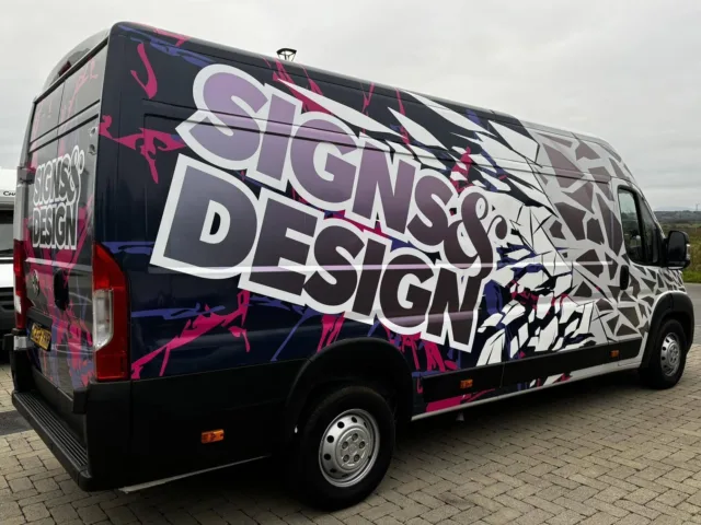 Branded Signs & Design van with bold vehicle graphics in Anglesey, North Wales