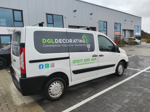 White van with DGL Decorating branding for commercial, industrial, and residential painting services